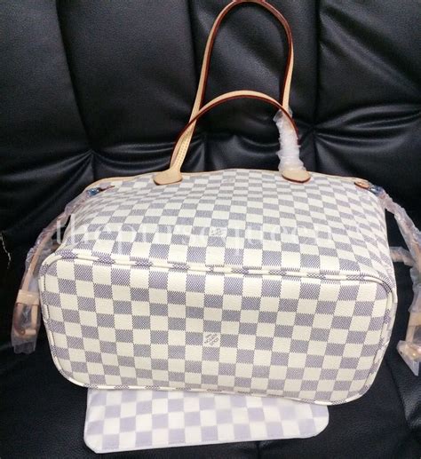 how to spot a fake louis vuitton damier purse|louis vuitton alma damier ebene.